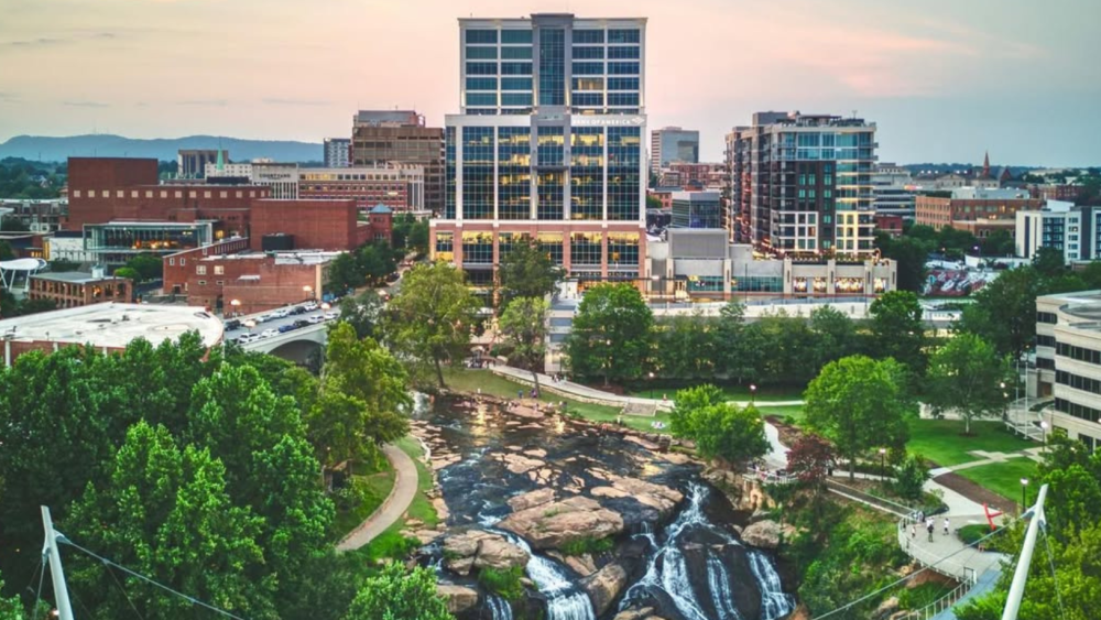 The skyline of Greenville, where 'Top Chef' Season 23 is set, marking the city's influence in the culinary arts.