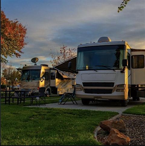 Families enjoying Carolina Camp Cedar's open house, with activities and tours underway.